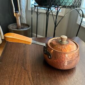 vintage Stockli (Netstal) hammered copper saucepan with a lid and a wood handle